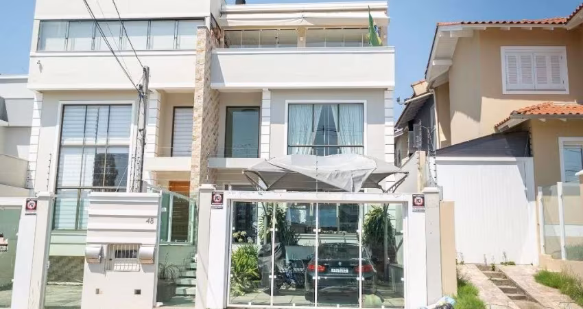 Encante-se com Esta Casa de Alto Padrão no Bairro Reserva Dom Feliciano!