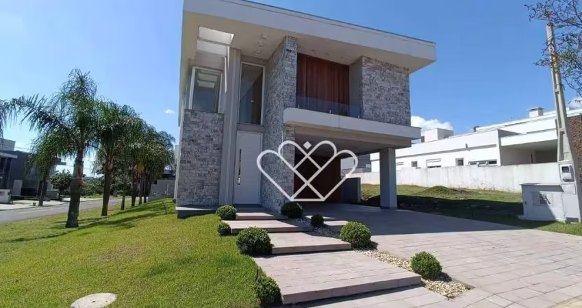 Casa de alto padrão com 3 suítes, piscina e churrasqueira em condomínio exclusivo