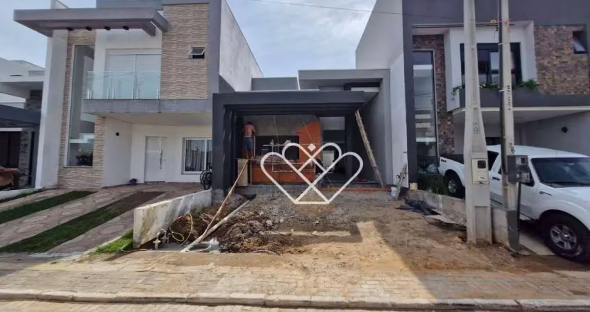 Casa de alto padrão com 3 dormitórios, suíte e churrasqueira em condomínio exclusivo