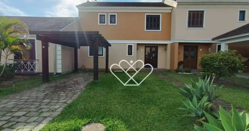 Casa com suíte e quintal amplo no condomínio reserva do arvoredo