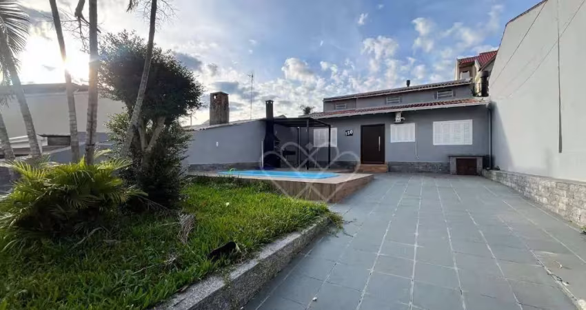 Casa com piscina e área gourmet para alugar no bairro bela vista em gravataí