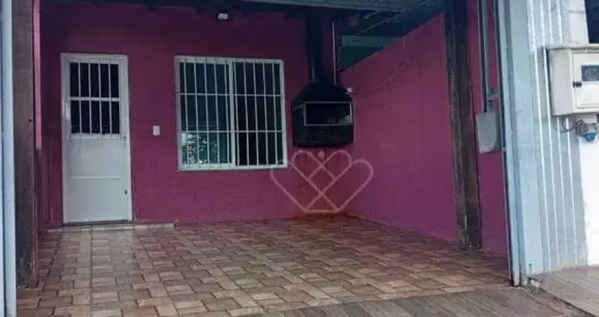 Casa térrea com 2 dormitórios e garagem fechada em bairro residencial tranquilo