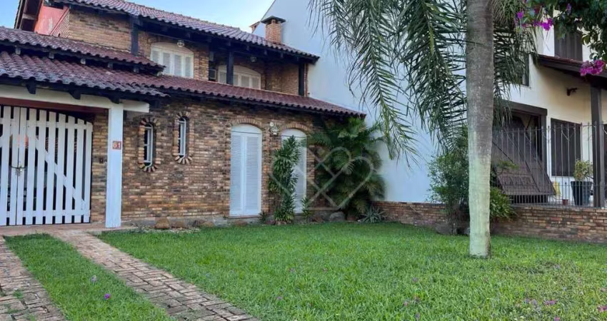Casa com piscina e amplo quintal no centro de gravataí – 3 dormitórios e suíte