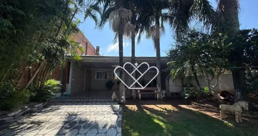 Casa espaciosa e aconchegante: 3 dormitórios, área gourmet e localização privilegiada!