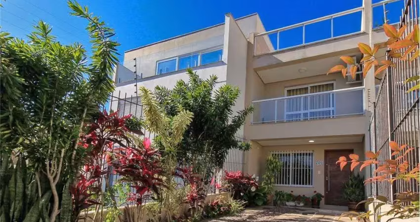Casa em condomínio fechado com 3 quartos à venda na Rua Heitor Kramer, Guarujá, Porto Alegre