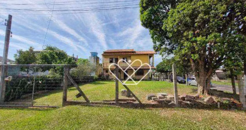 Casa de esquina com pátio amplo à venda no bairro santa fé, em gravataí