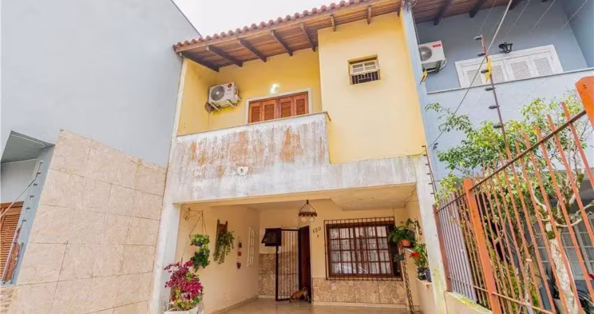 Casa em condomínio fechado à venda na Rua Moacyr Godoy Ilha, Guarujá, Porto Alegre