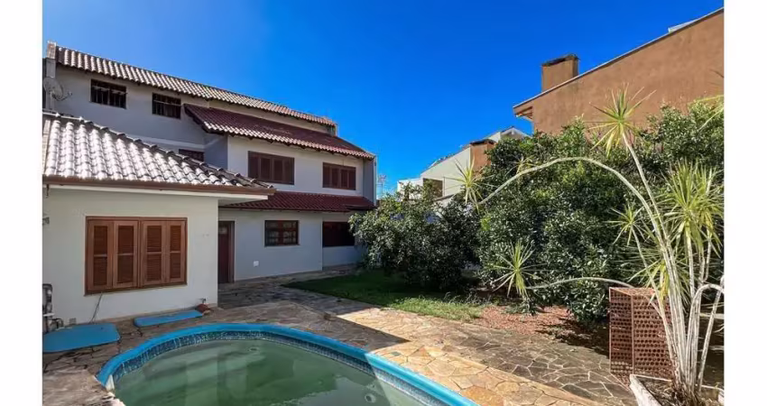 Casa em condomínio fechado com 4 quartos à venda na Avenida Açucena, Estância Velha, Canoas