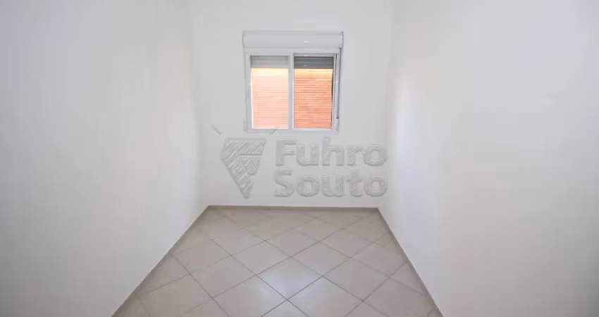 Apartamento no centro da cidade com dois quartos.