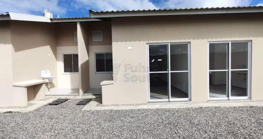 Casa Nova com 2 Dormitórios no Condomínio Altos dos Jerivás - Conforto, Segurança e Qualidade de Vida em Um Só Lugar!