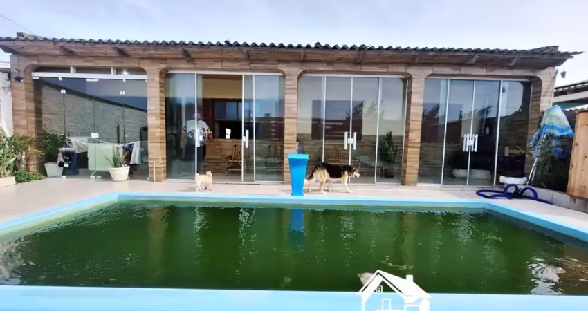 Incrível residência com piscina, 3 dormitórios, 1 suíte na praia de quintão/rs