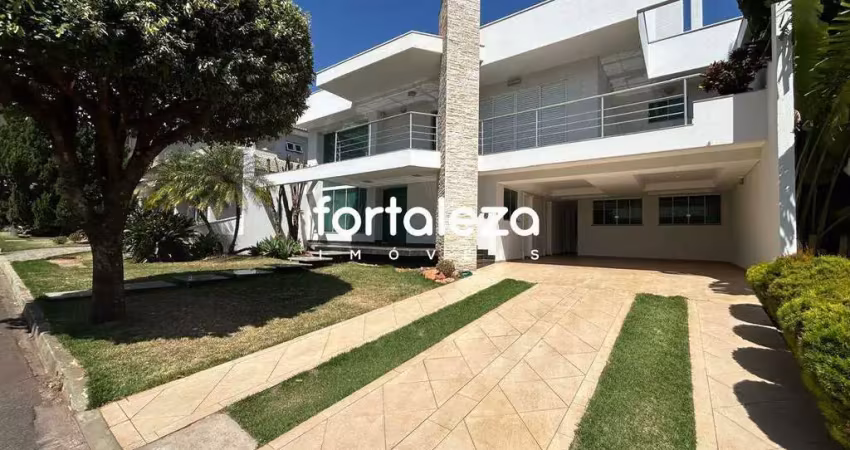 Sobrado em condomínio fechado com 4 suítes e 580 m² em maringá