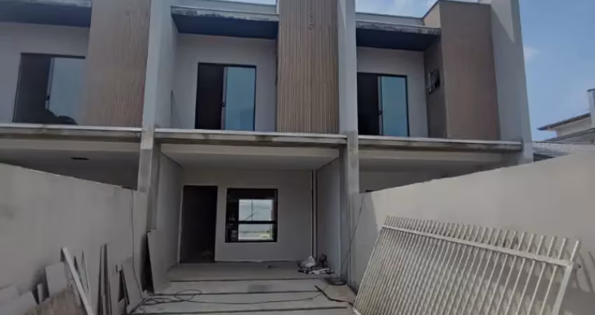 Sobrado geminado a venda no bairro costa e silva com suíte e 2 vagas.