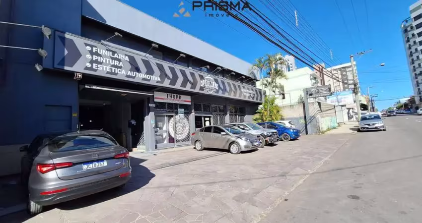 Sala comercial com copa, sacada e depósito no bairro medianeira em santa maria