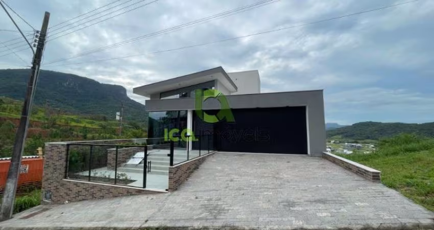 Casa alto padrão, com 3 quartos sendo 3 Suítes e Piscina borda infinita na Pedra Branca, Palhoça - SC, Próximo à Unisul.
