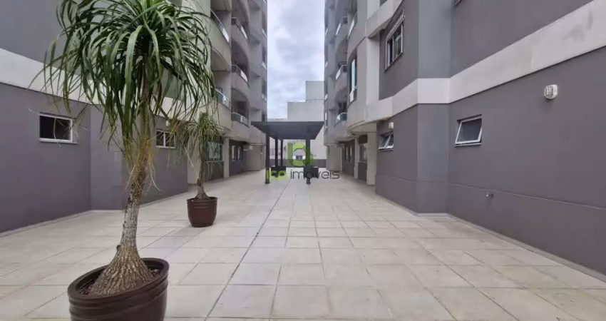 Apartamento 2 dormitórios mobiliado em barreiros com vista para o mar.