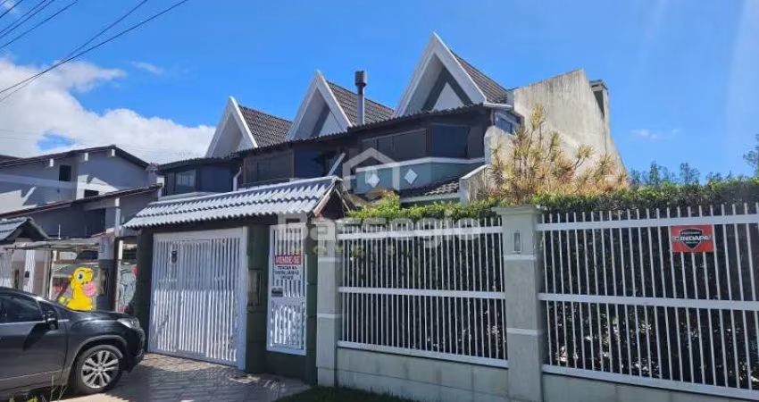SOBRADO  NO CENTRO DE TRAMANDAÍ COM 3 QUARTOS