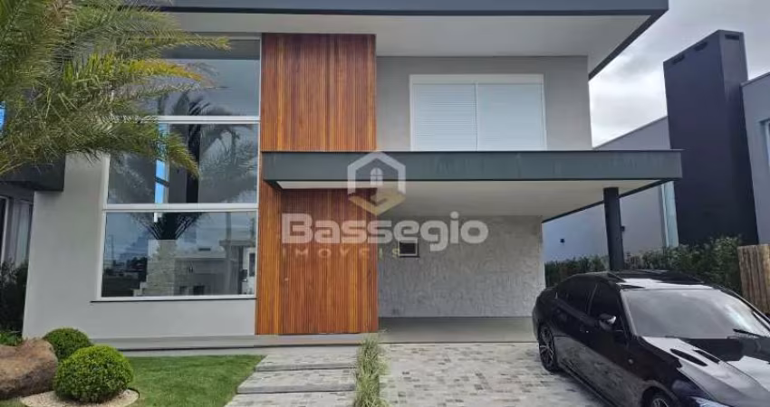 CASA DE LUXO EM CONDOMÍNIO FECHADO COM 4 SUÍTE