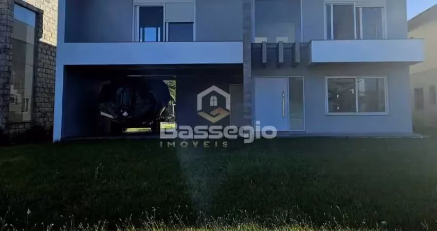 Casa no condomínio golden river em imbé com 4 suíte