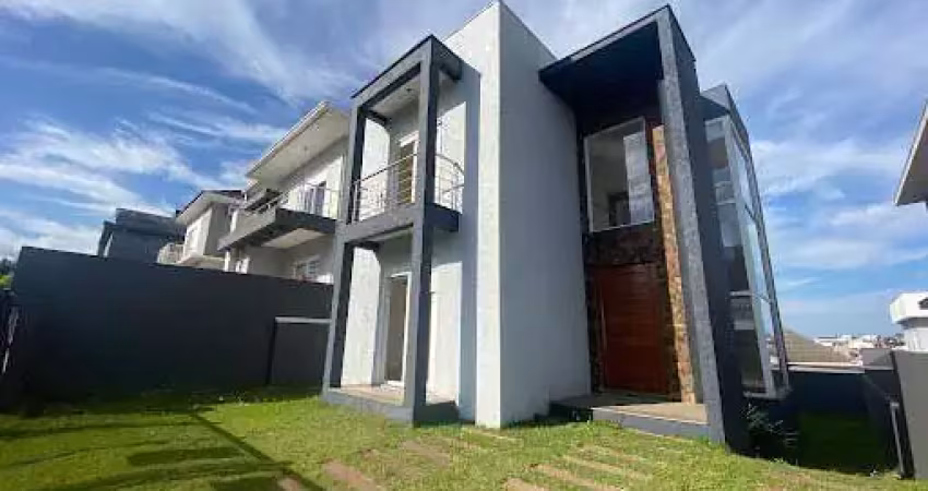 Sobrado à venda, 172 m² por R$ 949.000,00 - Condomínio Reserva do Arvoredo - Gravataí/RS