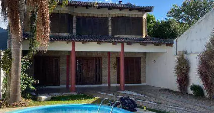 Sobrado com 3 dormitórios para alugar, 250 m² por R$ 6.750,00/mês - Dom Feliciano - Gravataí/RS
