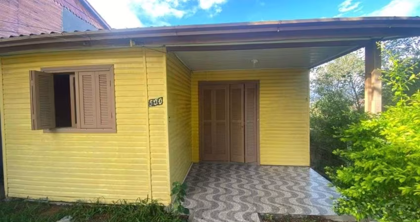 Casa com 2 dormitórios para alugar, 80 m² por R$ 1.550,00/mês - Auxiliadora - Gravataí/RS