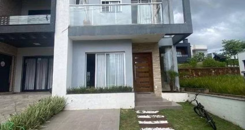 Sobrado com 3 dormitórios para alugar, 152 m² por R$ 7.997,00/mês - Primavera - Gravataí/RS