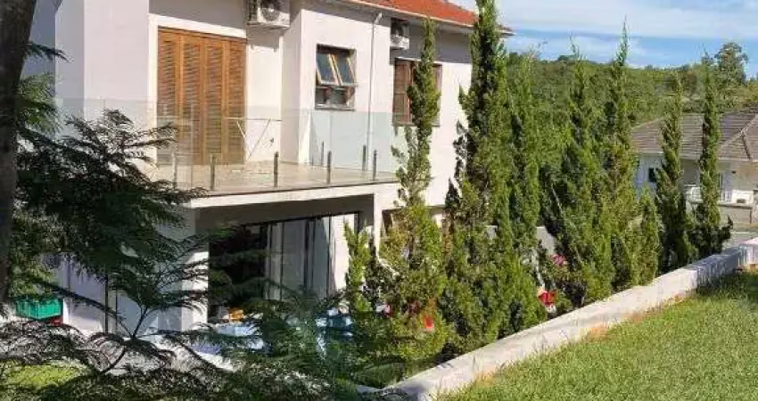 Sobrado com 3 dormitórios para alugar, 270 m² por R$ 8.530,00/mês - Jansen - Gravataí/RS