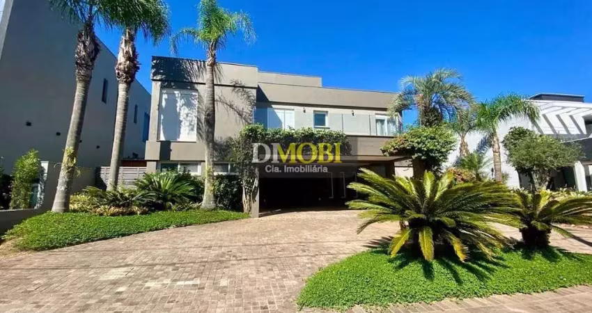 Sobrado com 3 dormitórios para alugar, 393 m² por r$ 25.428,52/mês - alphaville - gravataí/rs