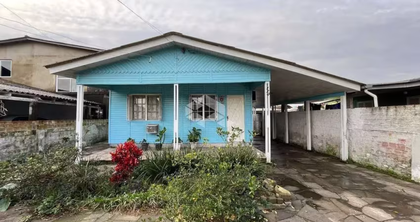 Casa mista a venda de 3 dornitórios e casa nos fundos de 2 dormitórios na tijuca alvorada-rs