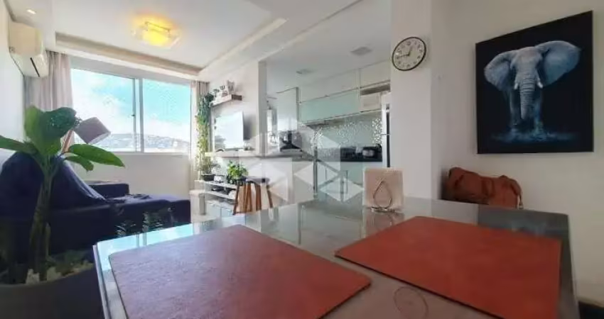 Apartamento a venda,  2 dormitórios, semimobiliado, com garagem, no bairro cristal