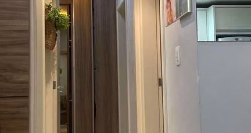 Apartamento de 2 quartos no bairro Floresta, São José-SC: 1 suíte, 2 salas, 1 banheiro e 1 vaga de garagem.