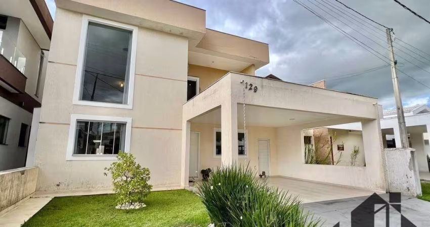 Casa com 3 dormitórios à venda, 295 m² por R$ 1.300.000,00 - Campos do Conde Chambord - Tremembé/SP