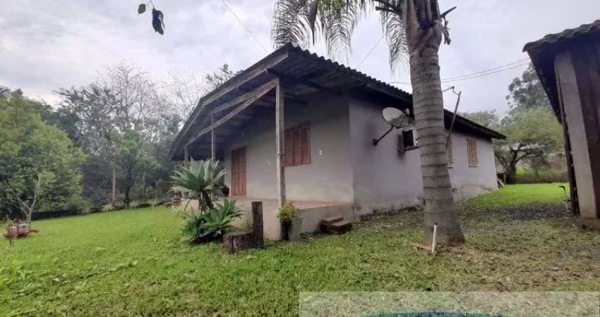 Casa à venda na Estrada da Cachoeira, 2152, Macaco Branco, Portão