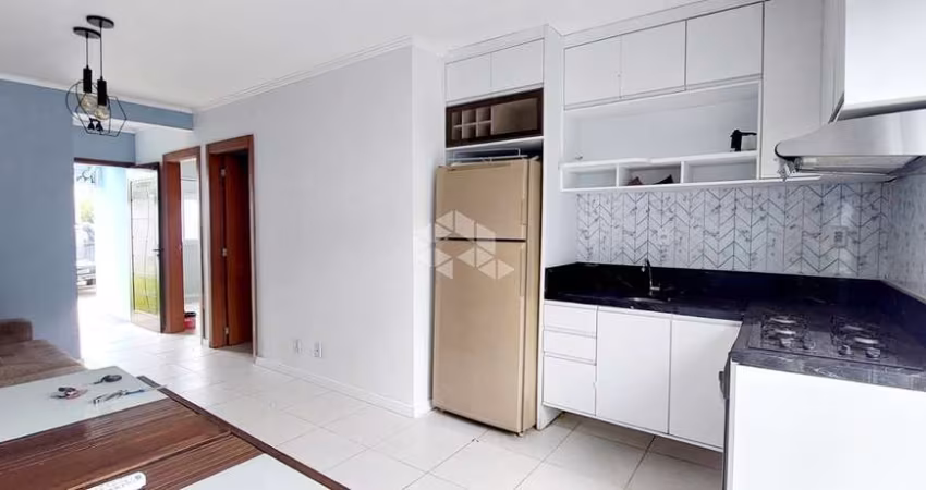 CASA TÉRREA DE 2 QUARTOS, VAGA DE GARAGEM E PÁTIO