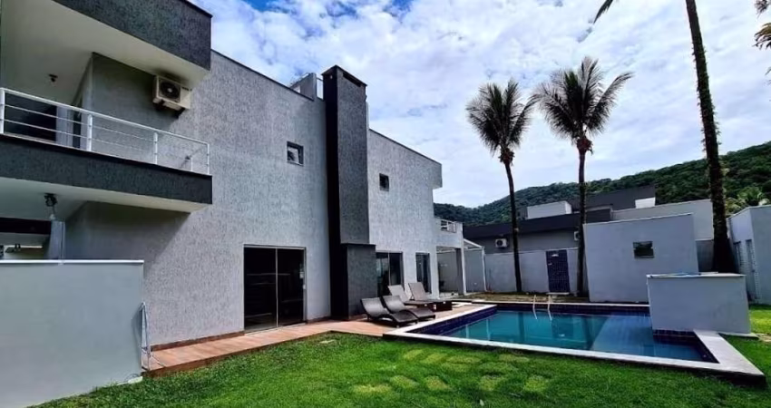 Casa com 4 dormitórios à venda, 282 m² por R$ 2.200.000 - Mocooca- Caraguatatuba/SP