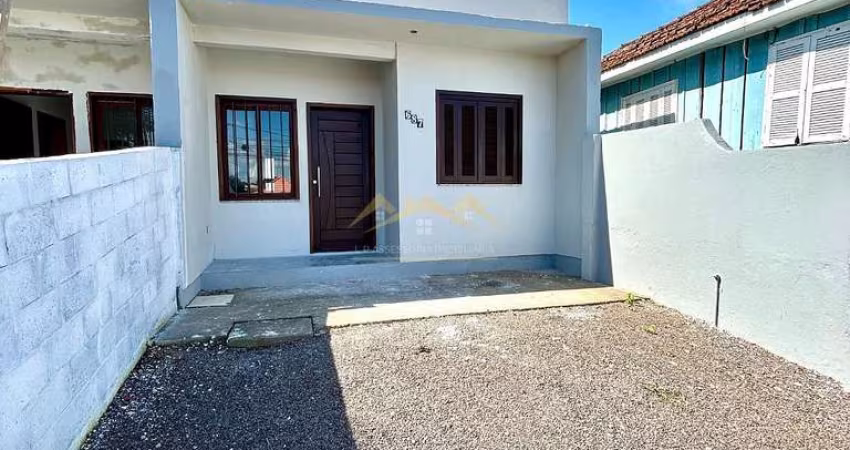 CASA DE DOIS DORMITÓRIOS COM SUÍTE