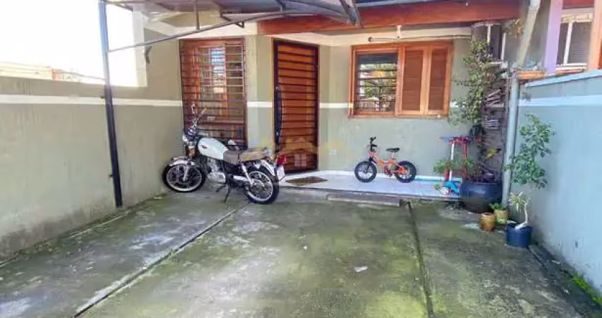 Casa com 2 quartos à venda na Rua Orlando Carlos, Monte Belo, Gravataí