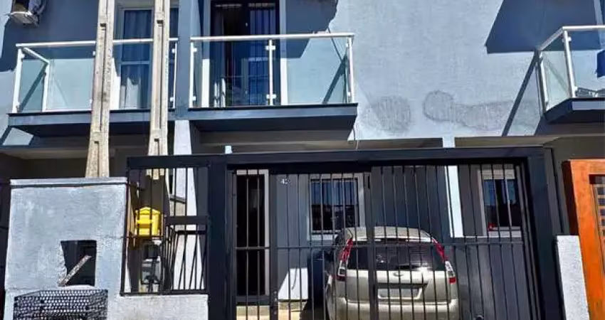 Sobrado à venda em gravataí, parque ipiranga, com 2 quartos, com 67 m²
