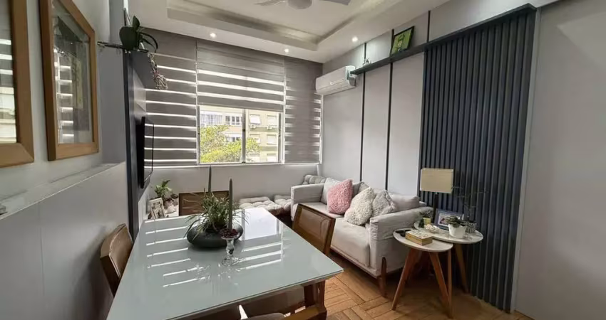 Na tijuca, apartamento à venda na rua uruguai, a 450 metros do metrô! sala, 2 quartos confortáveis, sol da manhã e vista verde. ideal para quem busca charme e praticidade. agende agora!