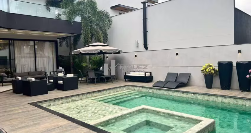 Casa triplex a venda no condomínio alphaville de alto padrão e sofisticação com 5 suítes e espaço para 4 vagas de garagem com uma infraestrutura impecável - barra da tijuca