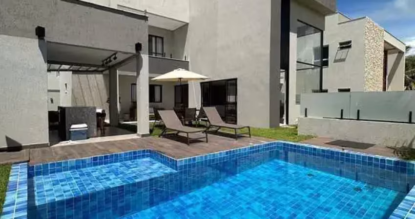 Casa em condomínio fechado com 5 quartos à venda na Rua Jardim do Lago, Guarajuba, Camaçari
