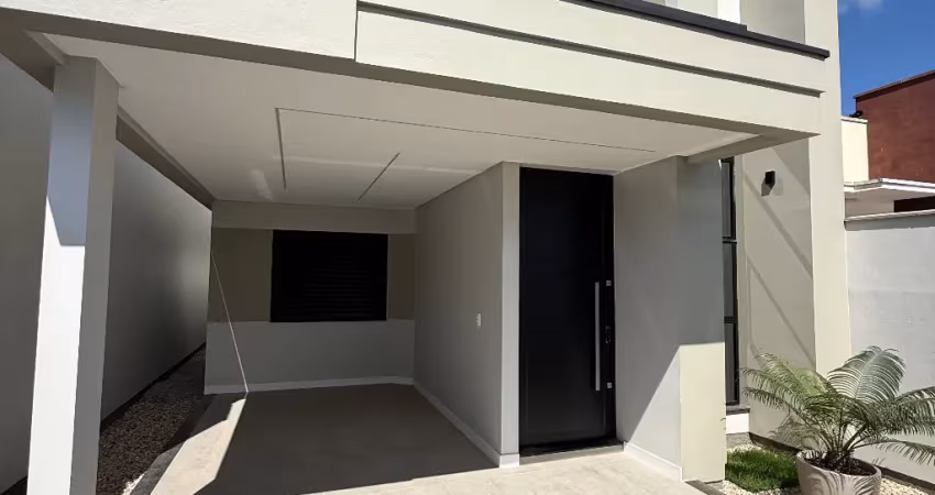 Casa três dormitórios sendo uma suíte localizada em tijucas santa catarina