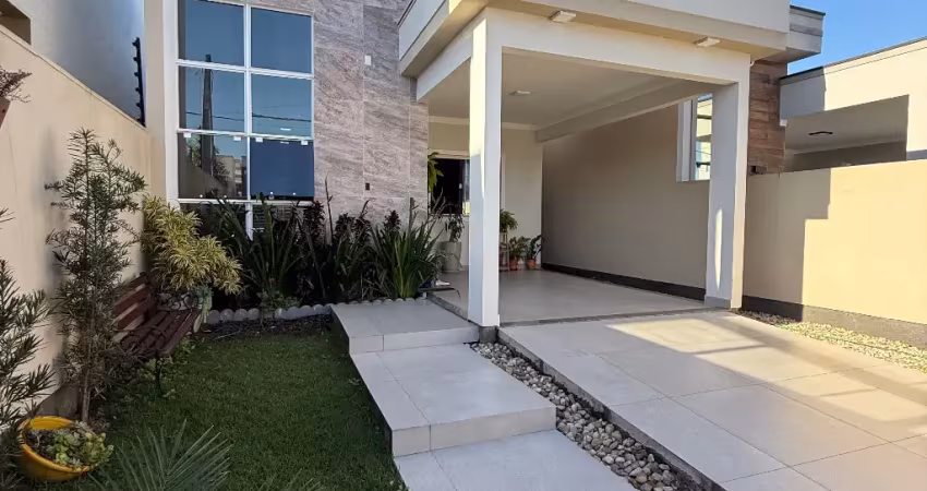 Casa mobiliada três dormitórios sendo uma suíte localizada em tijucas santa catarina
