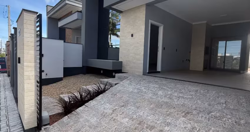 Casa três dormitórios uma suíte com 124m vaga para dois carros tijucas santa catarina