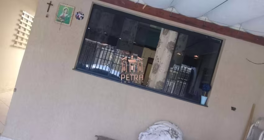 Casa com 2 dormitórios à venda, 100 m²