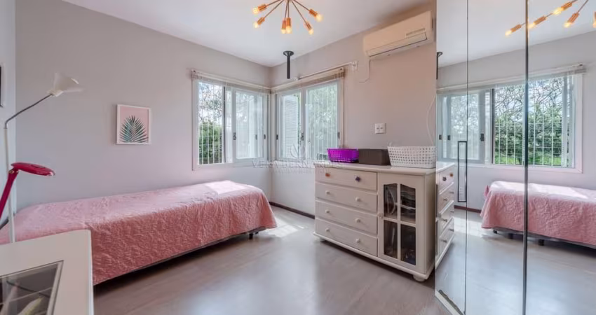 Casa com 3 quartos à venda na Rua Márcio Dias, 480, Nonoai, Porto Alegre