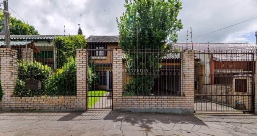 Casa com 3 quartos à venda na Rua Victor Silva, 136, Camaquã, Porto Alegre