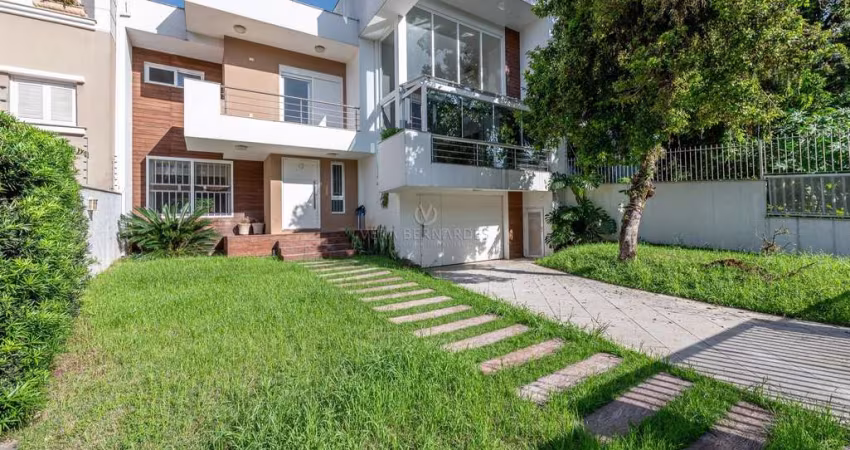 Casa com 3 quartos à venda na Avenida Fábio Araújo Santos, 1240, Nonoai, Porto Alegre
