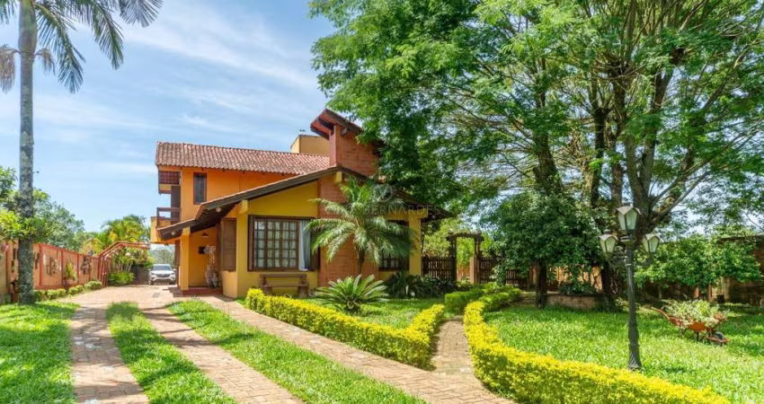 Casa com 4 quartos à venda na Estrada Costa Gama, 4730, Hípica, Porto Alegre